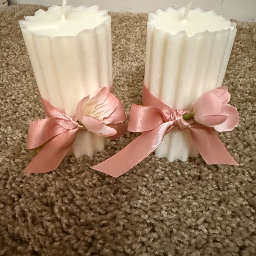 Chic White Candles with Pink Floral Accents